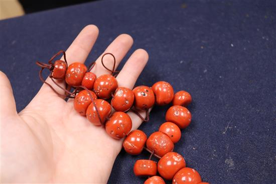 Mixed jewellery including costume, an amber necklace and a carved cameo shell.